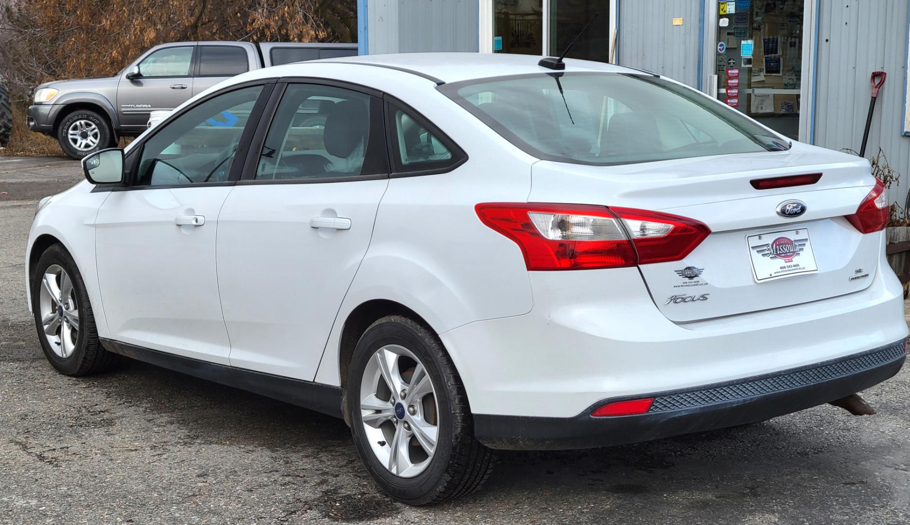 2013 White /Black Ford Focus SE (1FADP3F23DL) with an 2.0L I4 engine, 6 Speed Automatic transmission, located at 450 N Russell, Missoula, MT, 59801, (406) 543-6600, 46.874496, -114.017433 - Great Little Sedan. Excellent Fuel Economy. Only 69K Miles! Heated Seats. Air Cruise Tilt. Power Windows and Locks. AM FM CD XM Bluetooth. - Photo#7